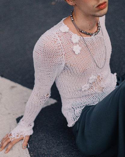 Knitted top with random holes and flowers