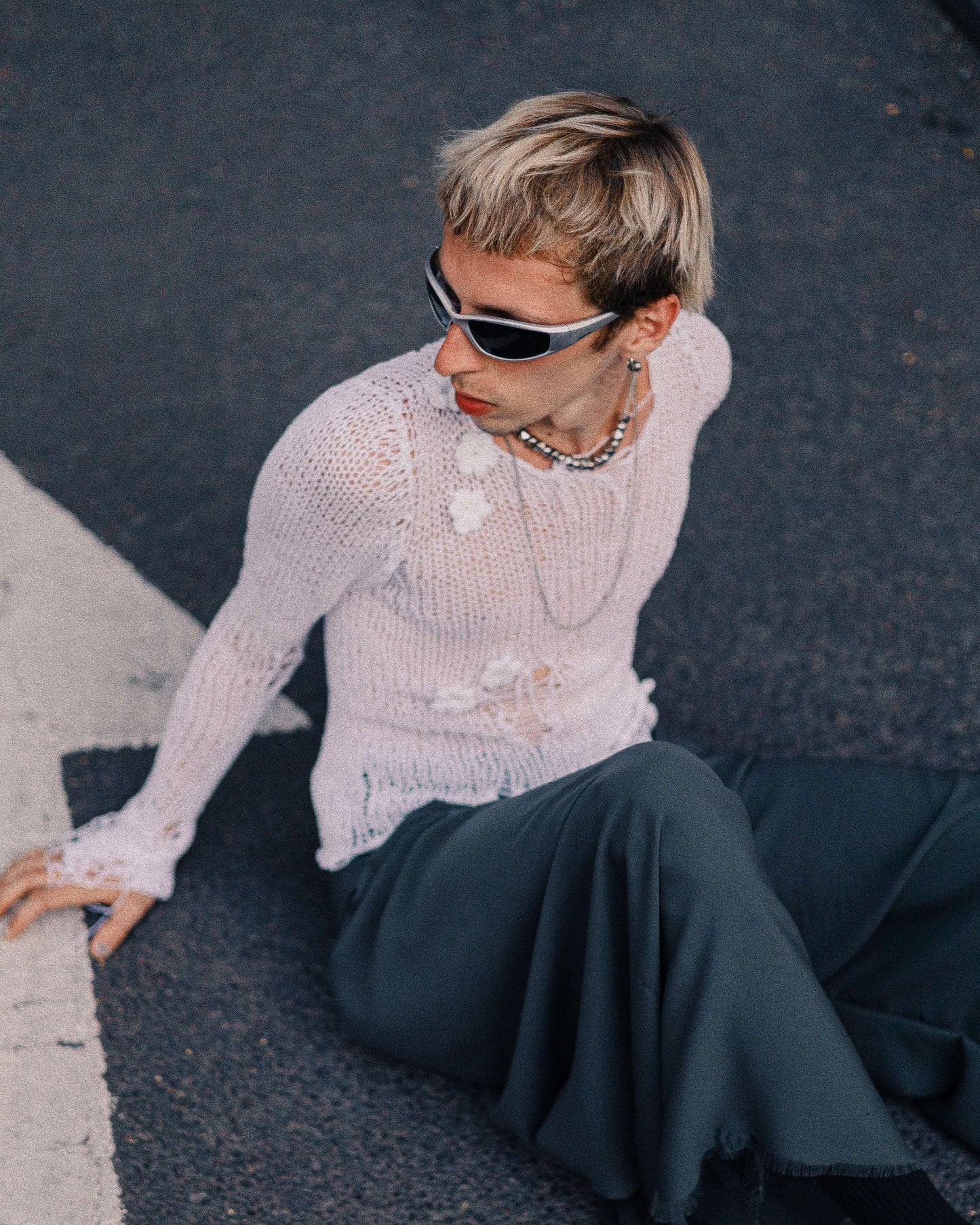Knitted top with random holes and flowers