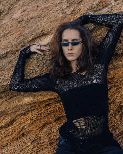 Knitted top with random holes