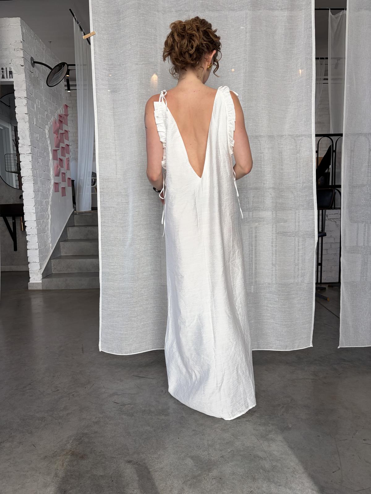 white long dress with ruffles and v back